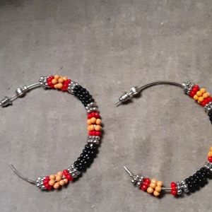 Black, yellow and red hoops
